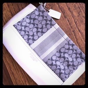 White and gray Coach clutch